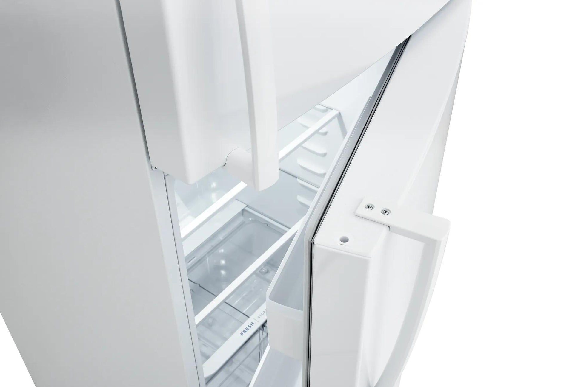 Close-up of a white top freezer refrigerator door opened, showing interior shelves and door bins in kitchen appliance setting