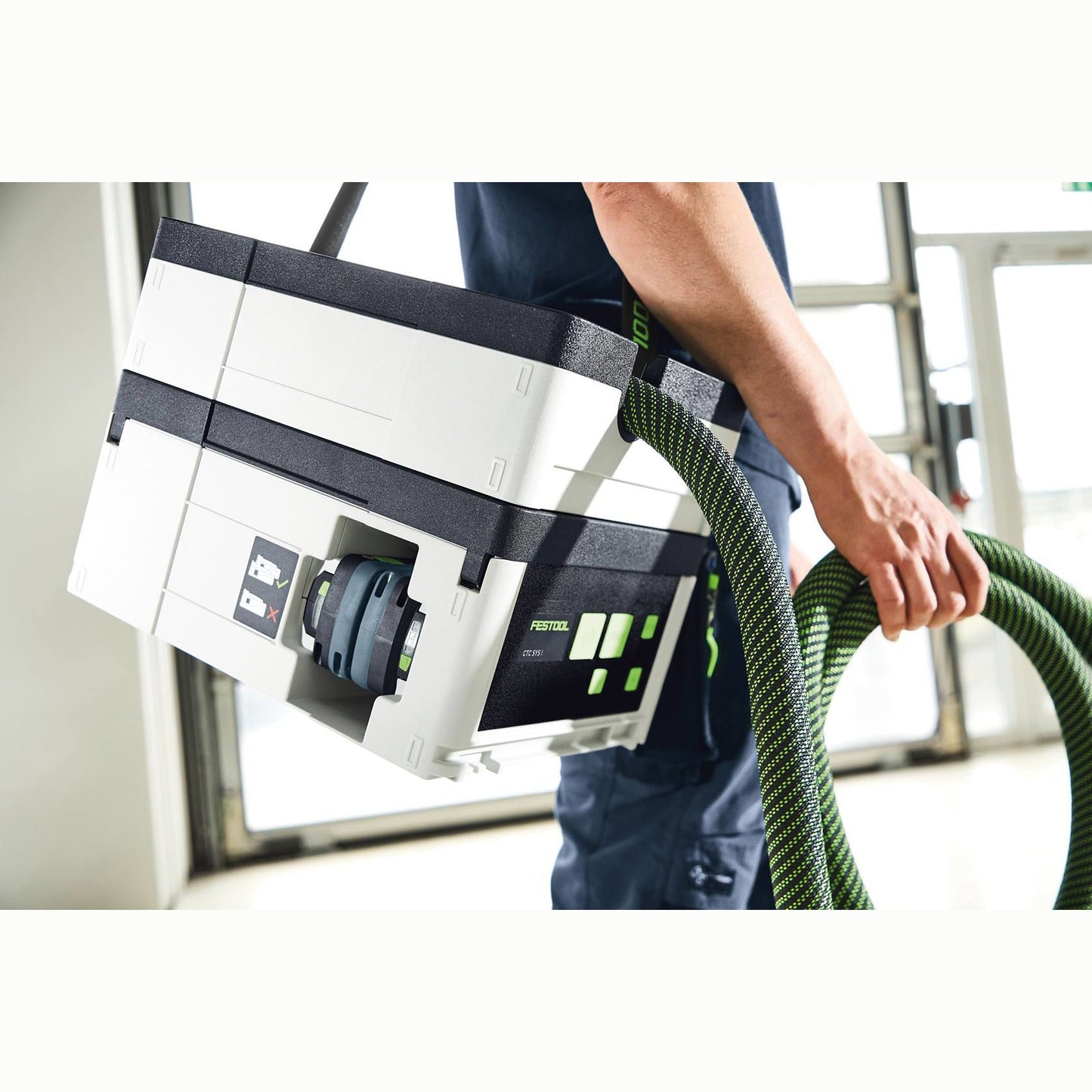 Portable cordless dust extractor with HEPA-Plus filter and hose for woodworking and air filtration tasks