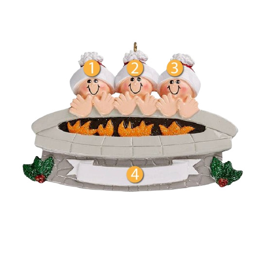Three smiling figures in winter hats around a glowing firepit with holly accents Christmas ornament under $50 collection