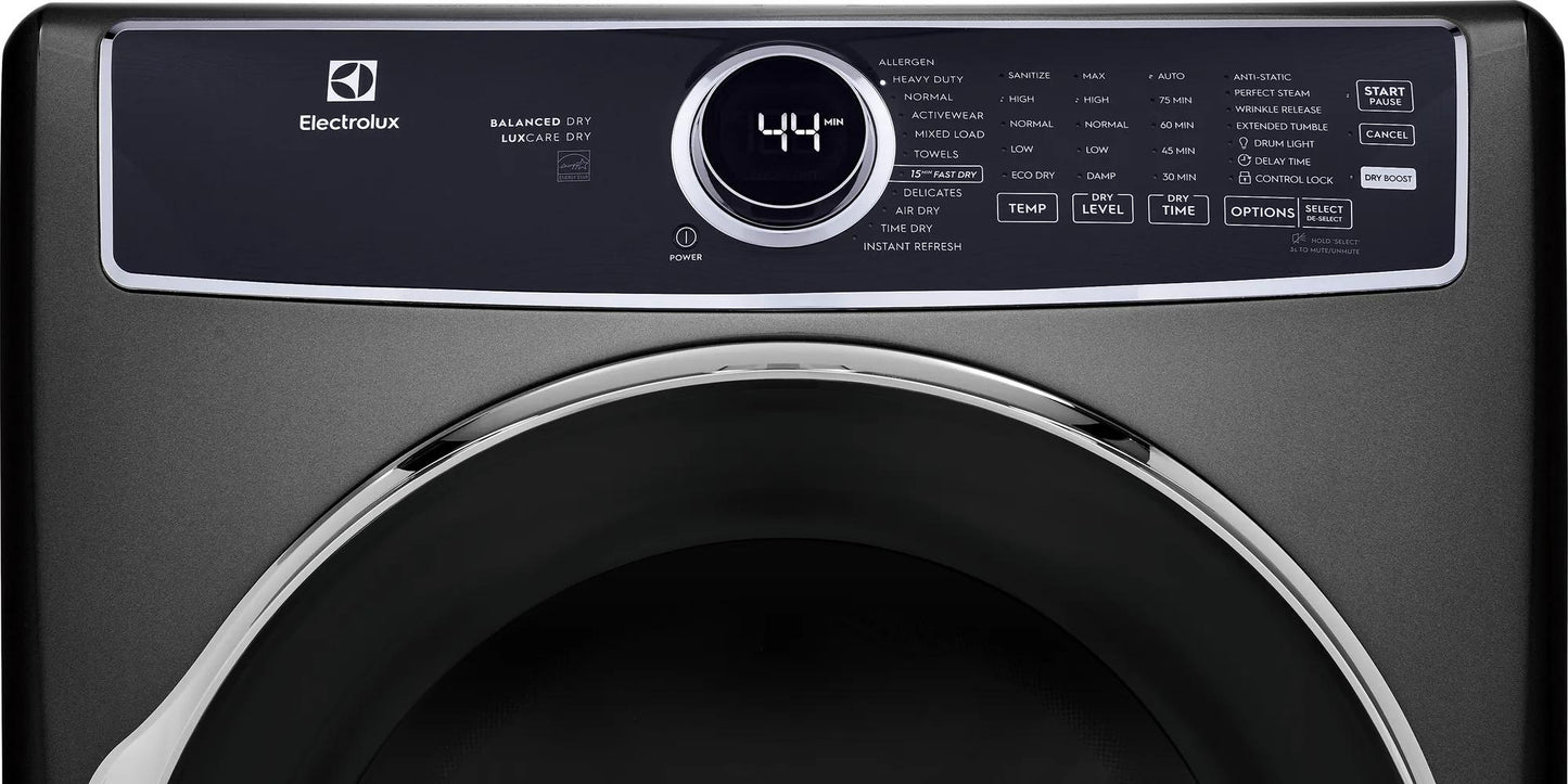 Close-up of black front load electric dryer control panel with digital timer and multiple cycle options in appliance setting