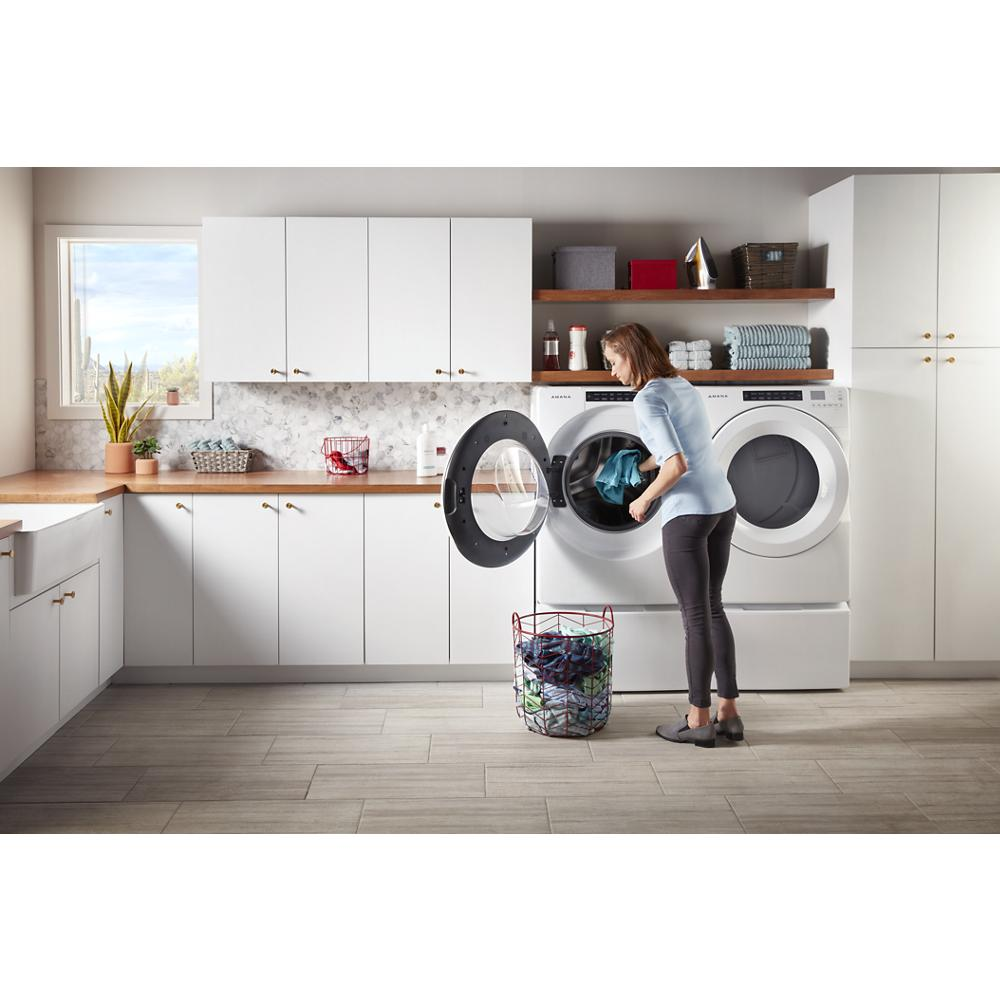 Modern laundry room with white washer and dryer on pedestals with storage in Appliance Parts & Accessories collection