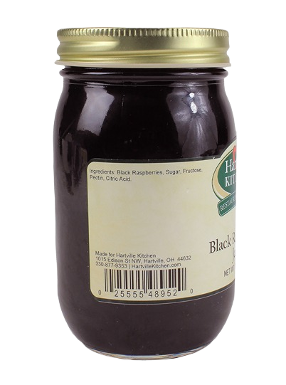 Glass jar of Hartville Kitchen black raspberry jam showing ingredients label and barcode on side