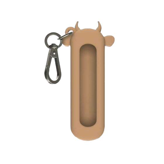 Silicone protective case shaped like a cow with a clip for attaching to keys or bags in wet sand color