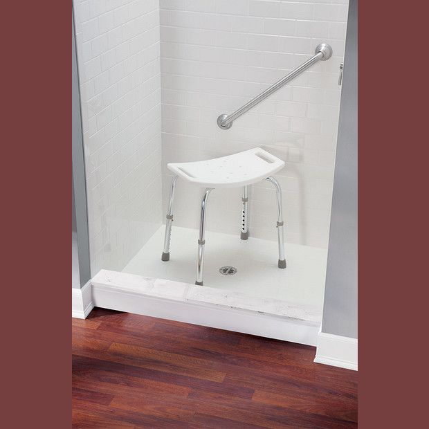 White adjustable shower chair with water-resistant seat and chrome legs for bathroom safety and accessibility use