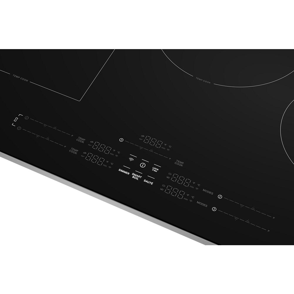 Black induction cooktop control panel with digital temperature display and five cooking zones touch interface