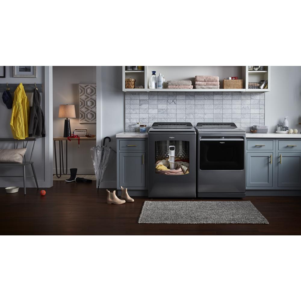 Laundry room with dark gray top load washer and matching gas dryer in modern appliances and Dryers collection