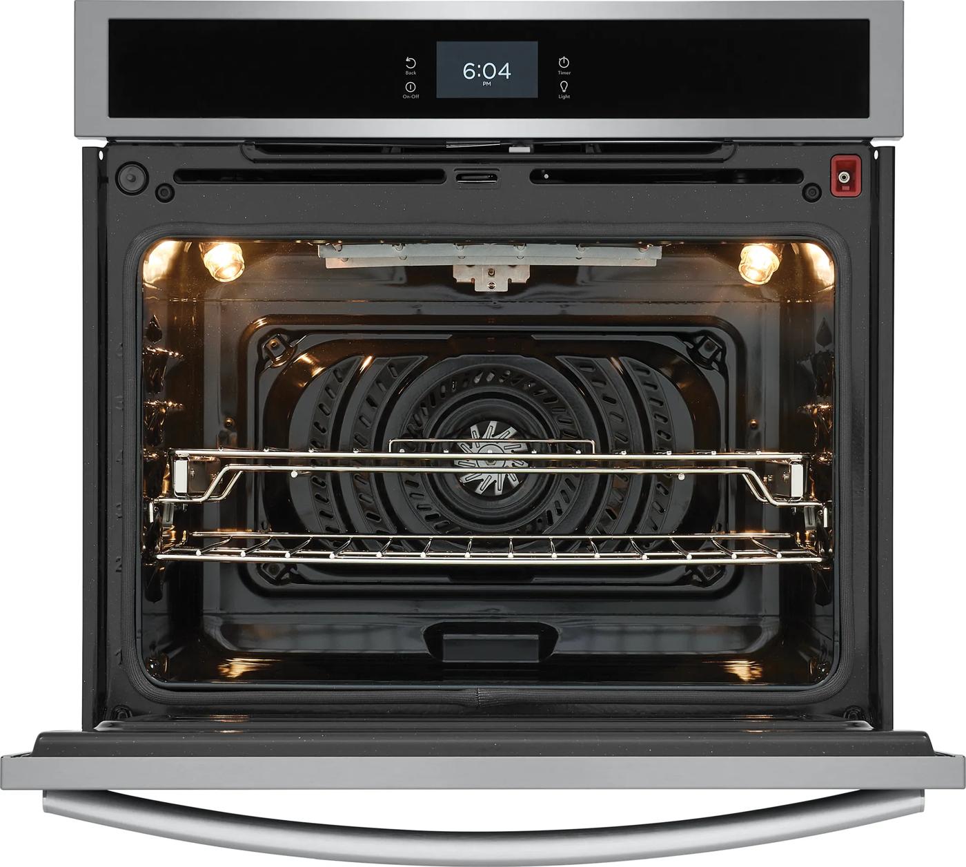Open 30-inch electric wall oven with total convection and interior light in kitchen appliances and wall ovens collection