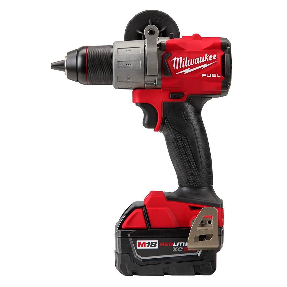 Compact cordless red and black hammer drill with ergonomic grip and battery for tools and home improvement tasks