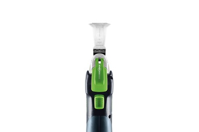 Cordless oscillating power tool with green and black handle for woodworking and home improvement tasks