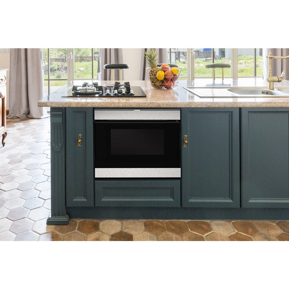 Built-in microwave drawer with stainless steel trim integrated into blue cabinetry in a modern kitchen setting.