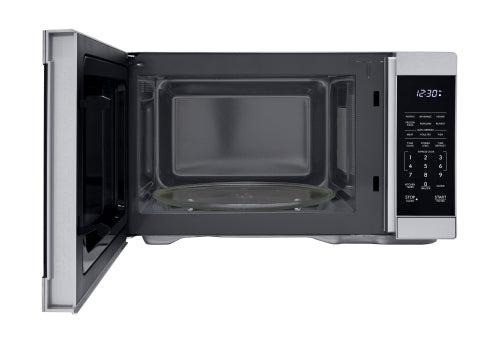 Open stainless steel microwave oven with digital control panel and glass turntable from kitchen appliances collection