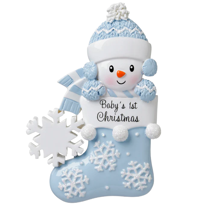Adorable baby snowman wearing blue hat and scarf, holding "Baby's 1st Christmas" sign in festive stocking ornament under $50