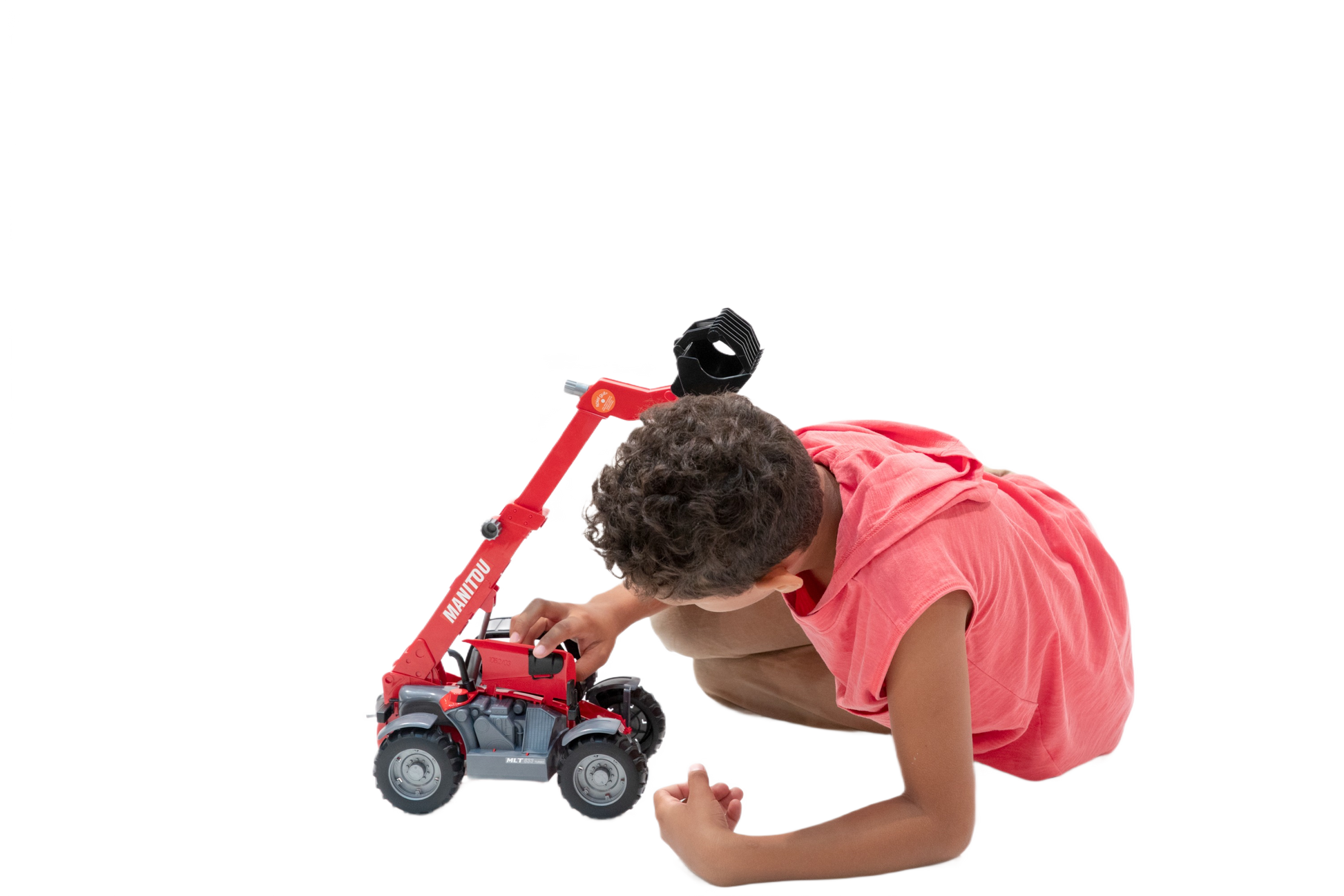 Child engaging with red Bruder Manitou telescopic loader toy in Vehicles & Remote Controlled Toys and Bruder Toys collections