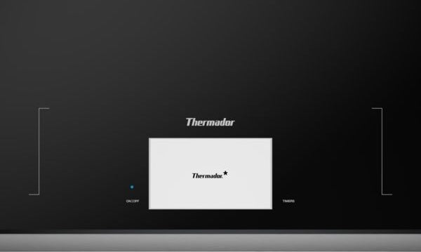Dark gray induction cooktop control panel with digital display and touch controls from Thermador cooktops collection
