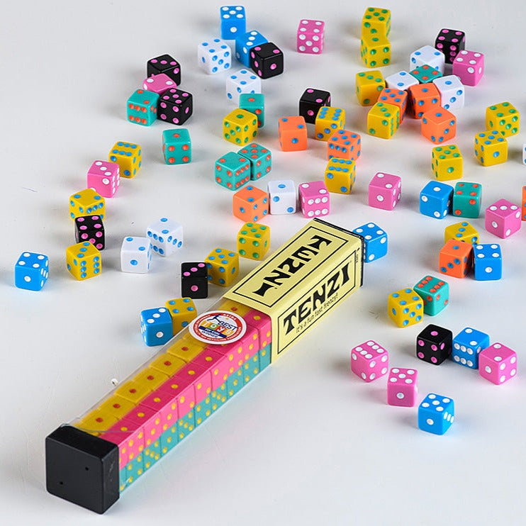 Clear tube of multicolored dice next to scattered dice in bright colors for lively gameplay in Toys & Games collection