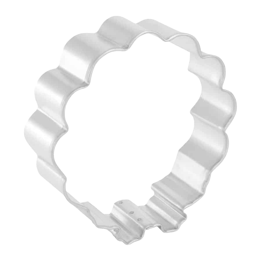 Silver metal turkey-shaped cookie cutter with scalloped edges for baking and kitchen use