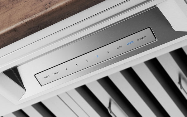 Close-up of stainless steel range hood control panel with digital touch buttons from kitchen appliances collection