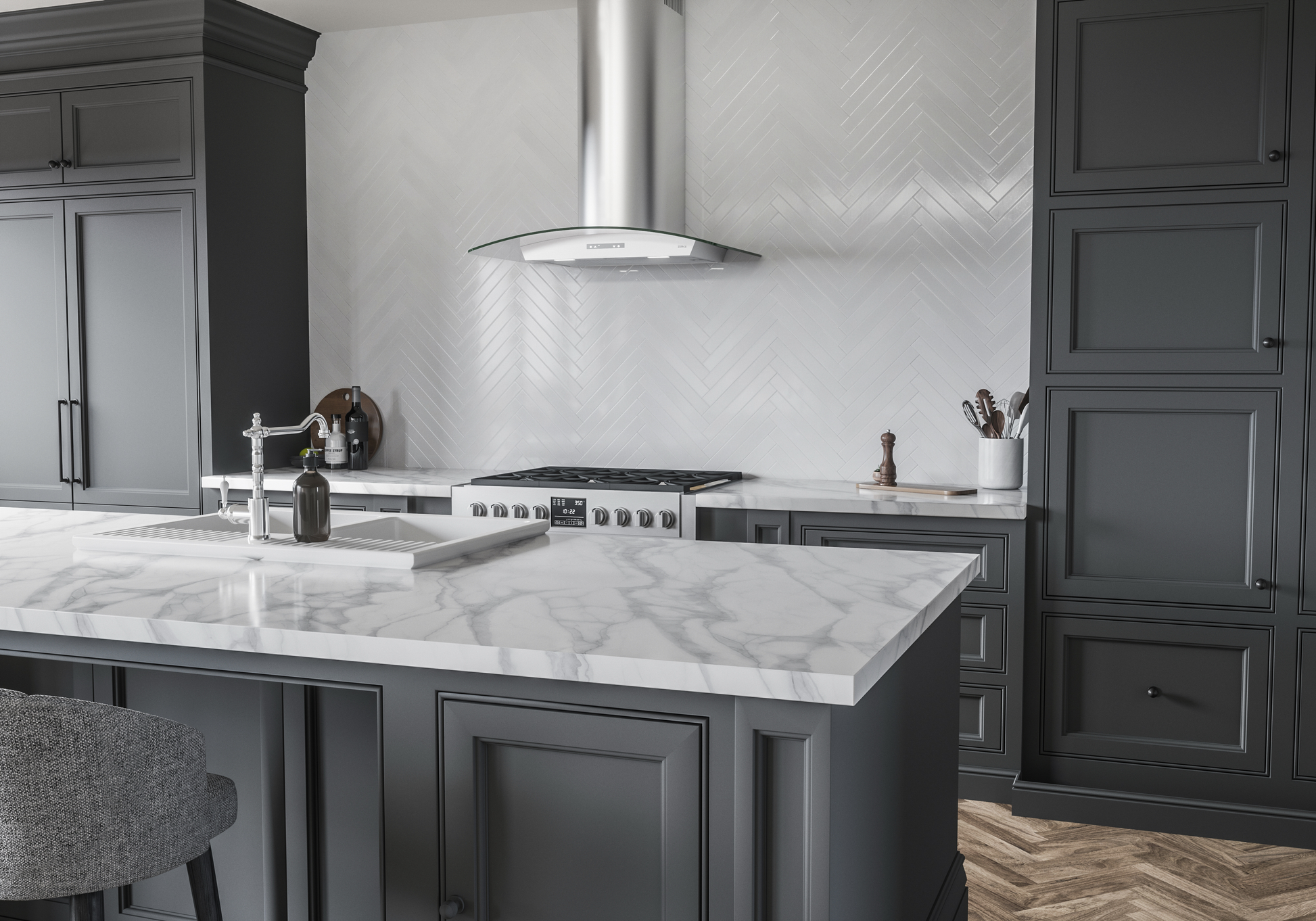 Stainless steel curved canopy chimney hood with LED lights above a stove in modern kitchen with dark cabinetry and marble island in appliances collection