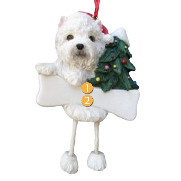White Westie dog holiday ornament holding a bone with dangling legs and decorated Christmas tree background