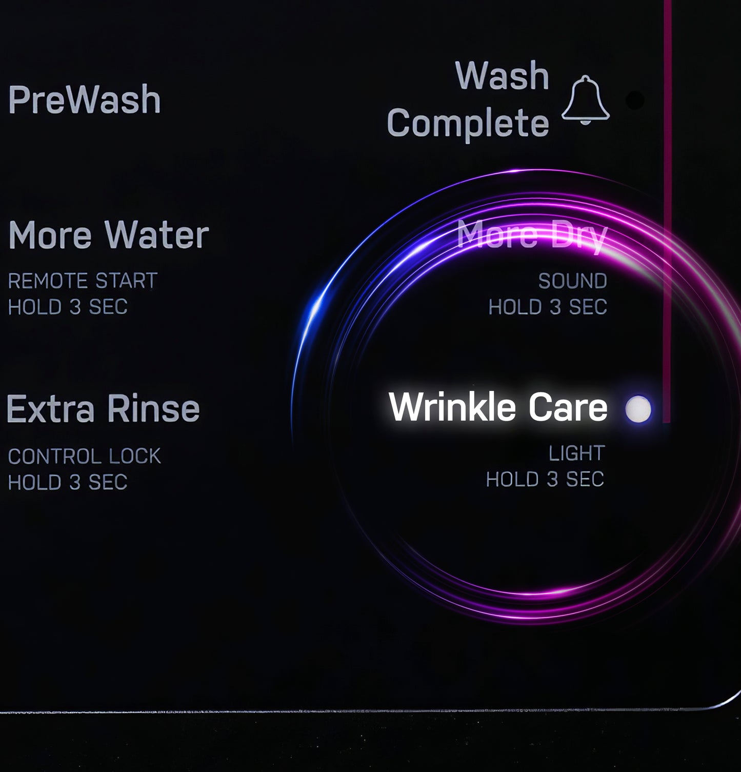 Control dial illuminated with cycle options including PreWash, More Water, Extra Rinse, and Wrinkle Care on washer combo panel.
