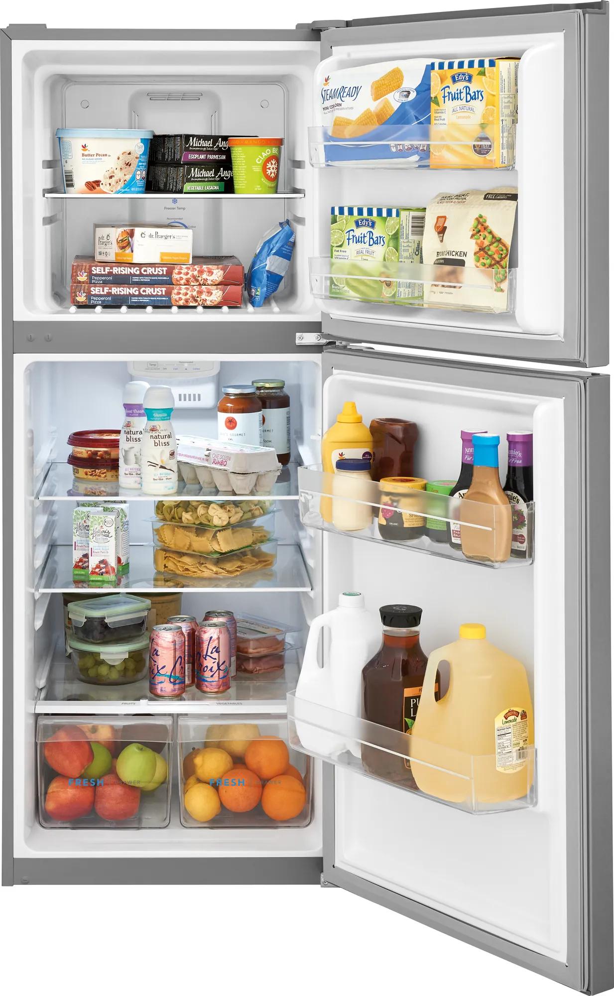 Open top freezer refrigerator with adjustable shelves, clear door bins, crisper drawers, and bright interior lighting in appliances collection