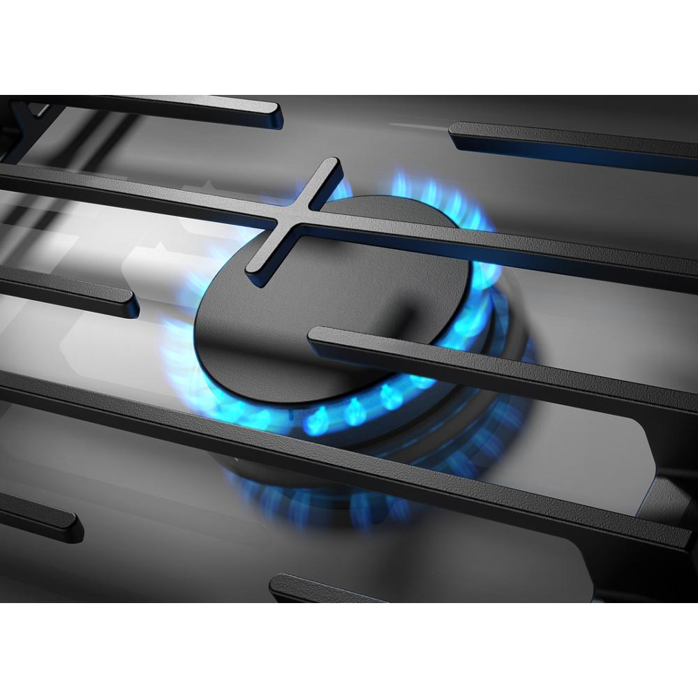 Close-up of black gas cooktop burner with blue flame and EZ-2-Lift cast-iron grates in kitchen appliances collection