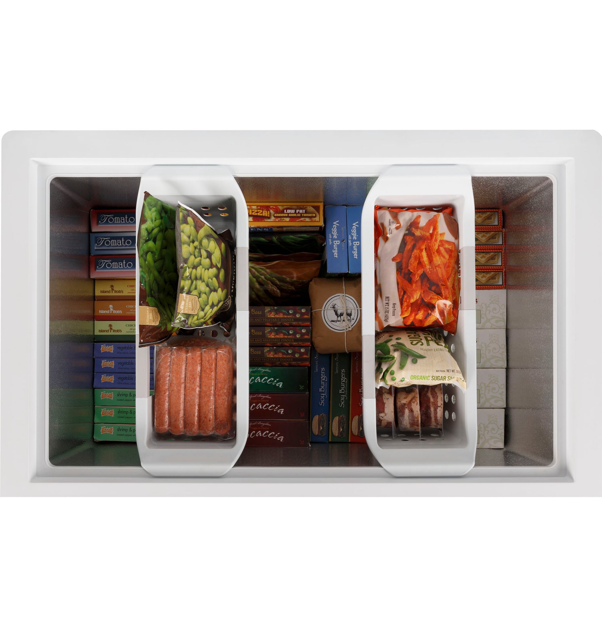 Top view of a white manual defrost chest freezer neatly stocked with various frozen vegetables, meats, and packaged foods inside compartments