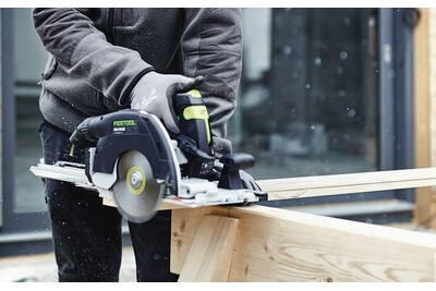 Festool cordless carpentry saw cutting wood with guide rail for precise results in power tools and home improvement collections