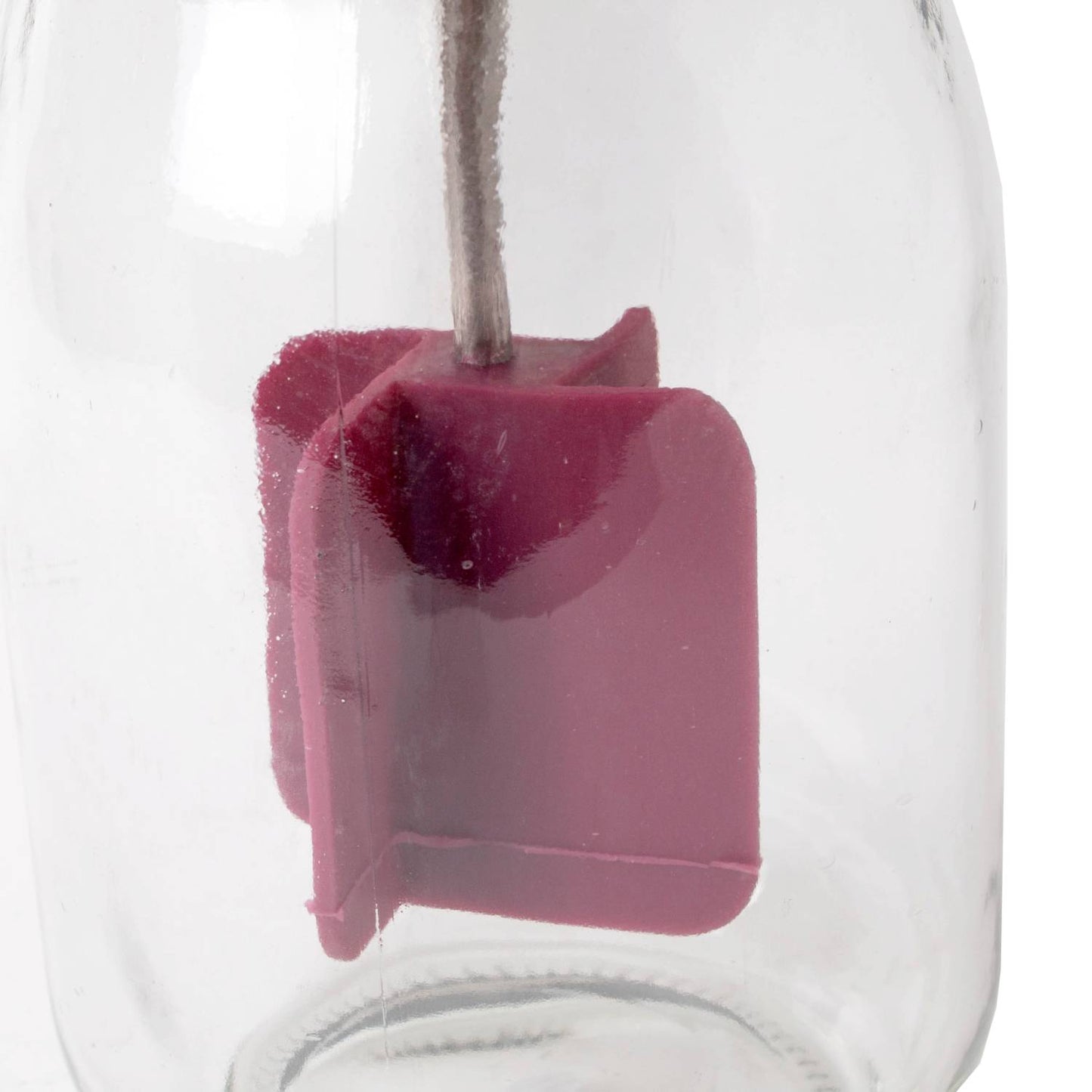 Close-up of red paddle inside clear glass jar for mini butter churn in Small Kitchen Appliances collection under $100