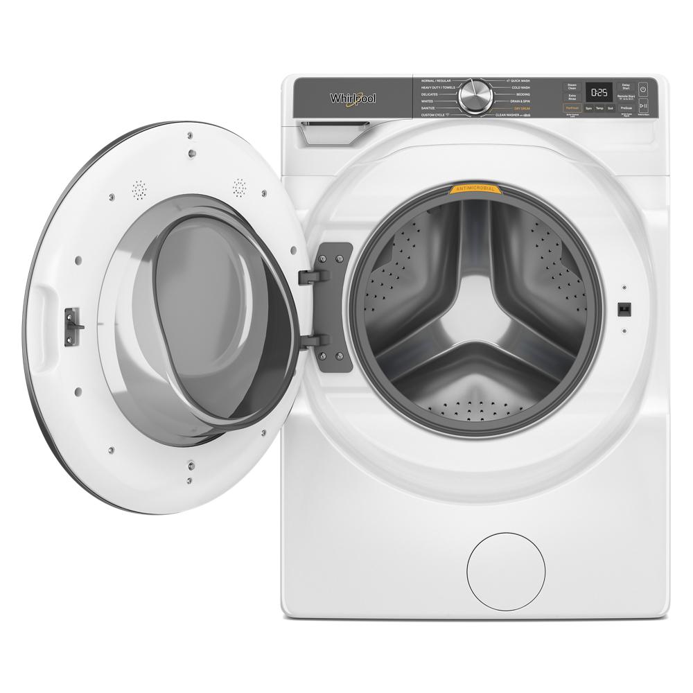 White smart front load washer with open door showing stainless steel drum in Washers & Dryers collection