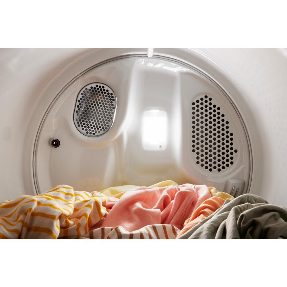 Inside view of 7.0 cu. ft. gas dryer drum with assorted clothes, part of laundry appliances collection