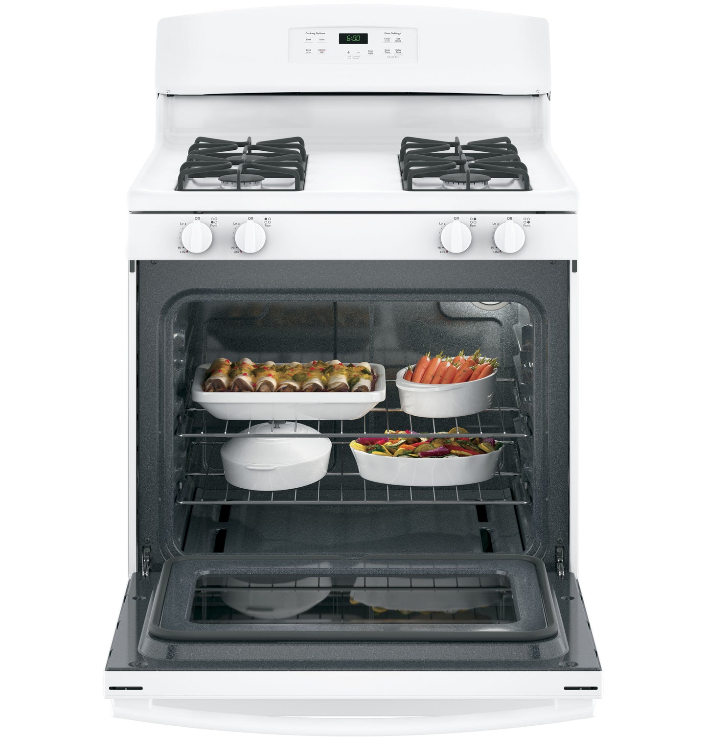 Open oven door of white free-standing gas range showing multiple dishes inside in kitchen appliances collection