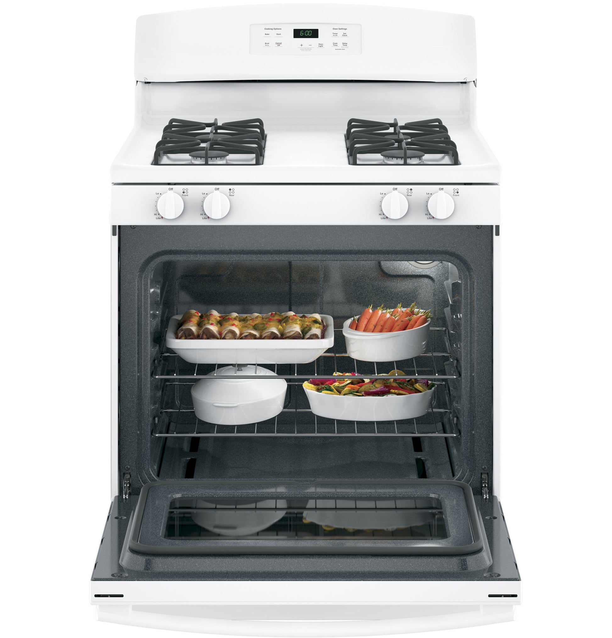 Open oven door of white free-standing gas range showing multiple dishes inside in kitchen appliances collection