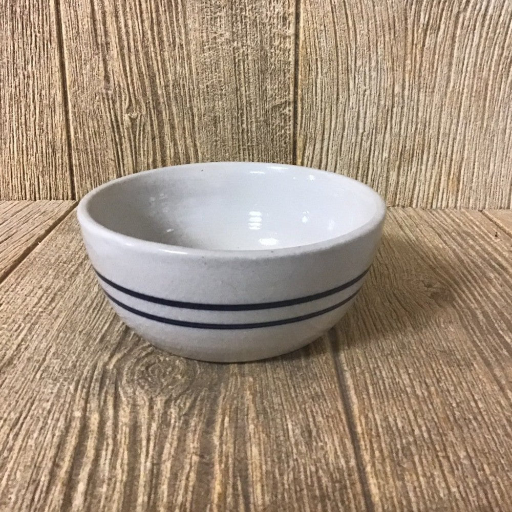 Hand-thrown stoneware bowl with classic double blue stripes, ideal for serving in kitchenware and tableware settings