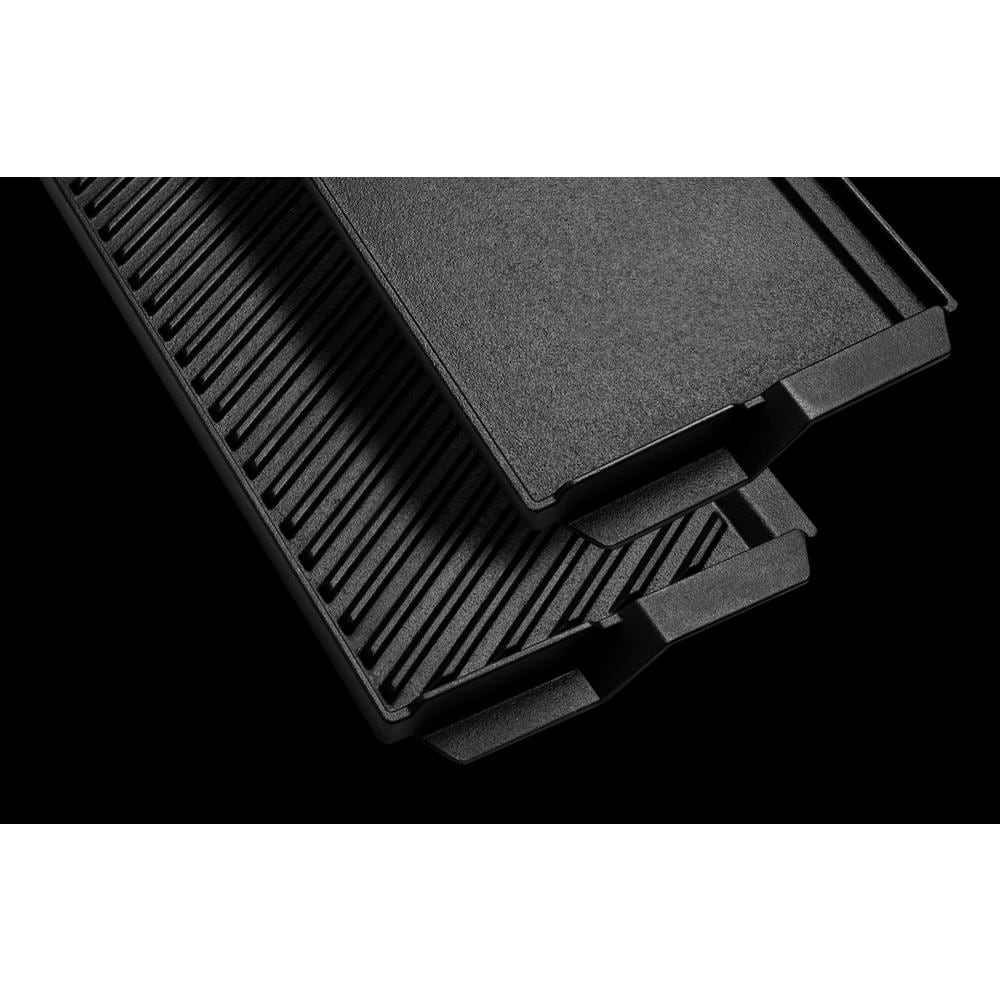 Close-up of black reversible grill and griddle accessory for 30-inch stainless steel slide-in electric range in kitchenware collection