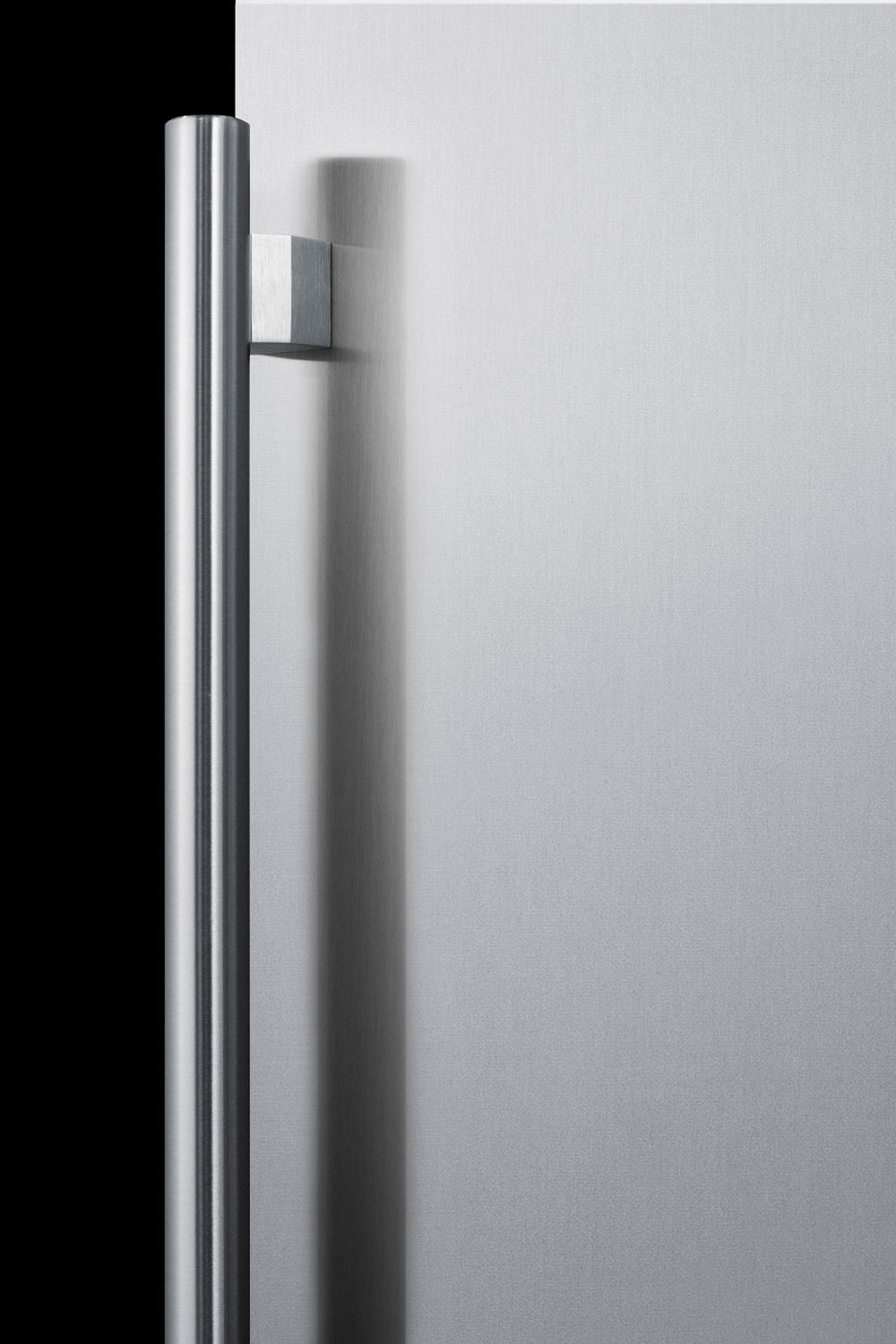 Close-up of stainless steel freezer door handle in modern kitchen appliance from Freezers & Ice Makers collection