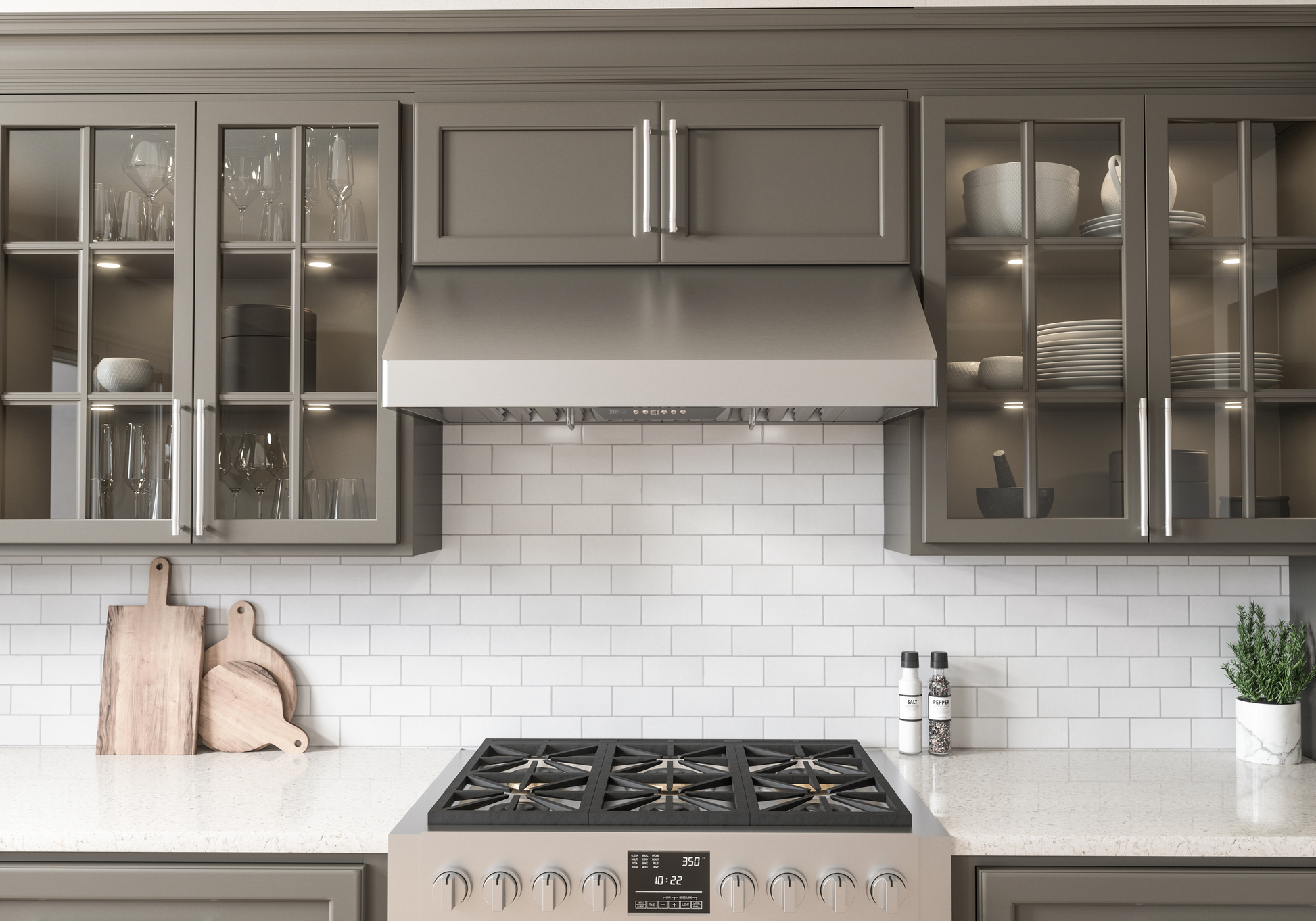 Stainless steel under-cabinet range hood with LED lighting and pro baffle filters installed above a gas cooktop in a modern kitchen setting, featured in Range Hoods, Kitchen & Kitchenware, All Products, and Appliances collections.