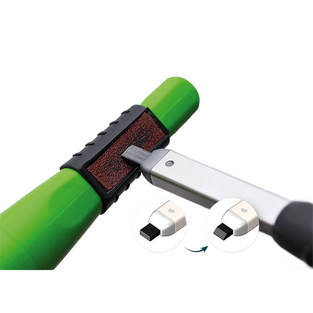 Green marking tool with replaceable tip being sharpened for precise use in home improvement and construction tasks
