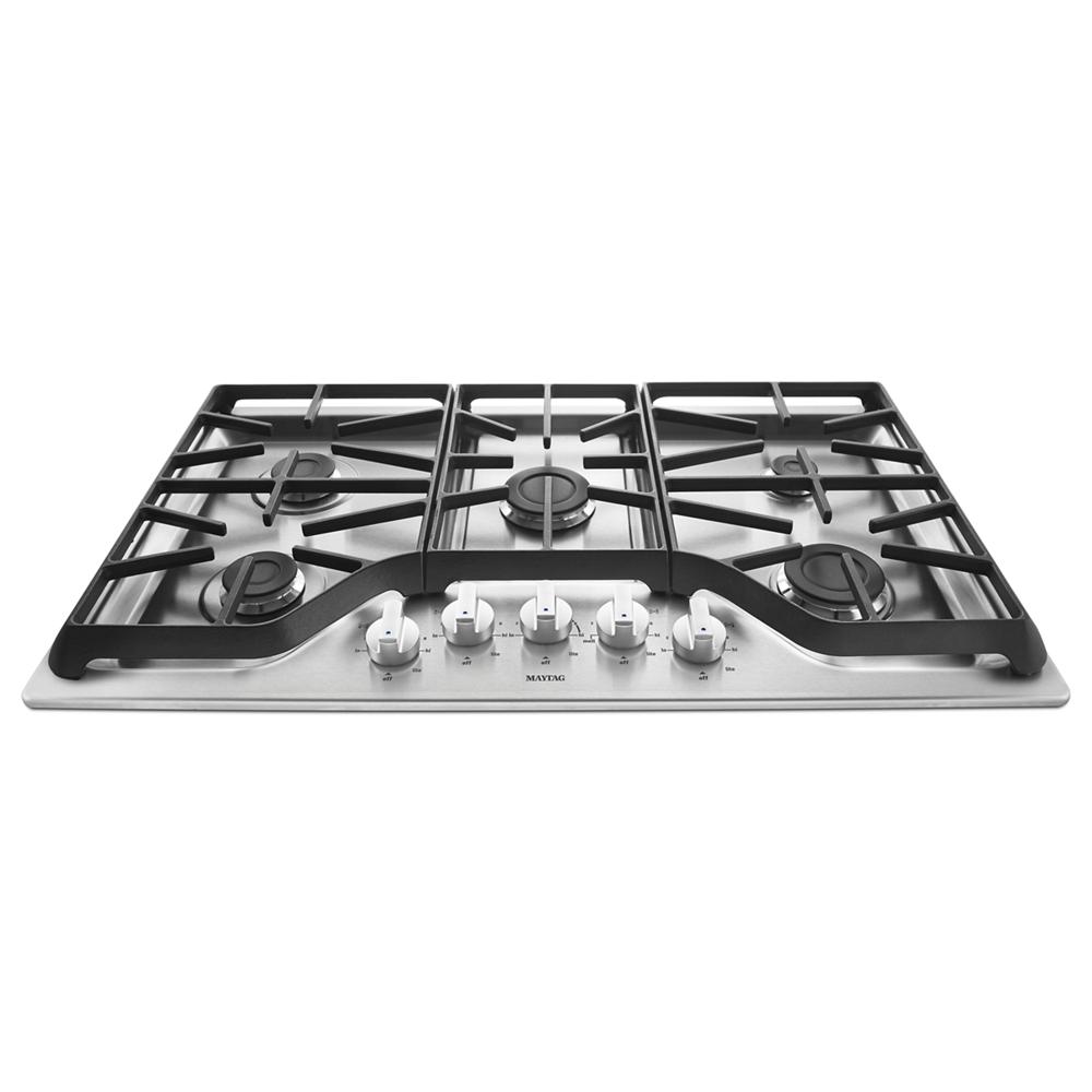 36-inch stainless steel gas cooktop with five burners and front control knobs for kitchen and home improvement.