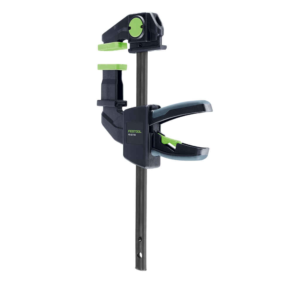 Black and green one-handed clamp designed for woodworking and power tool accessories in tool and home improvement collections