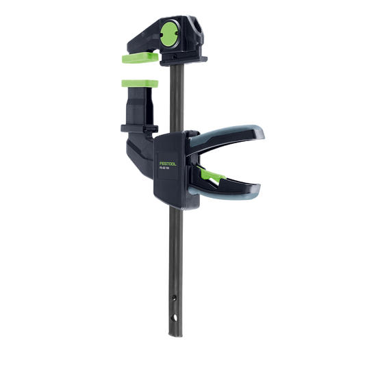 Black and green one-handed clamp designed for woodworking and power tool accessories in tool and home improvement collections