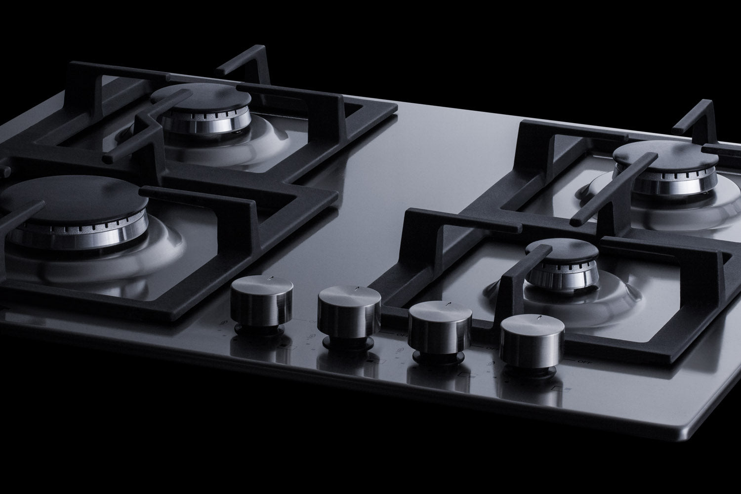 Black propane gas cooktop with four burners and stainless steel controls from kitchen appliances and cooktops collection