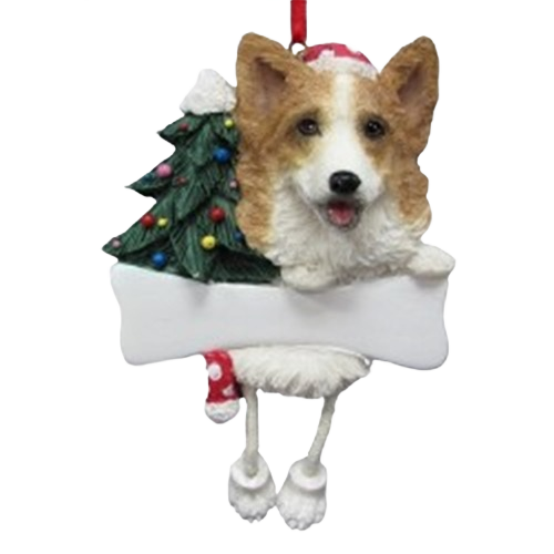 Holiday ornament featuring a Welsh Corgi head with dangling legs and decorated Christmas tree background.