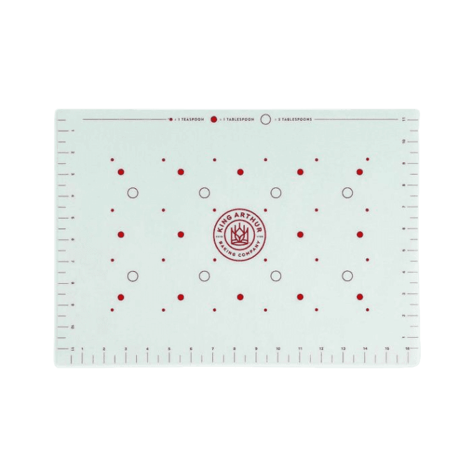 White non-stick baking mat with red measurement markings and King Arthur Baking Company logo in center