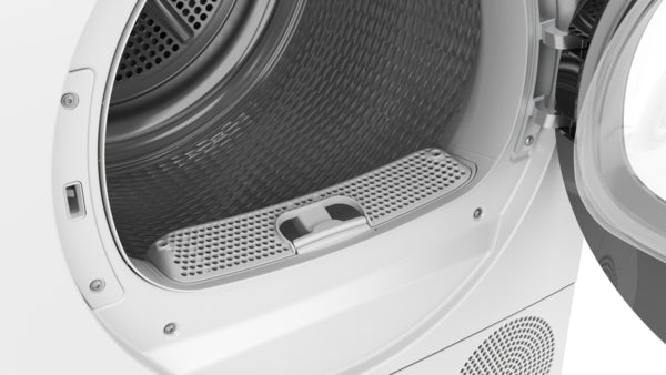 Close-up of open dryer drum and lint filter of compact Bosch 300 Series condensation dryer in white finish