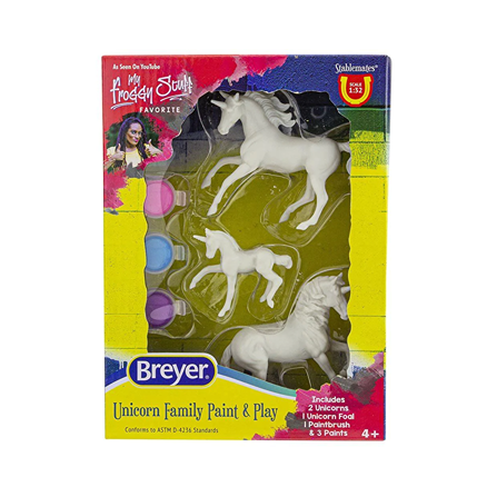 Set of three unpainted unicorn and foal figurines with paint pots and a paintbrush for creative play activities