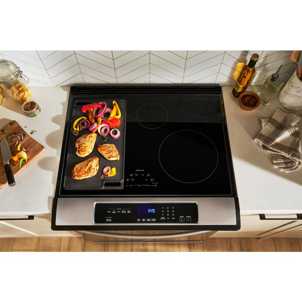 black and stainless steel 30-inch induction range with digital touch controls and cooking surface in kitchen appliances collection