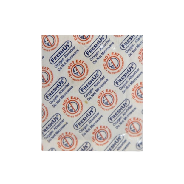 Small sealed paper packet labeled Freshus oxygen absorber with warning text for home improvement storage use