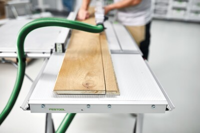 Adjustable aluminum outfeed table extension supporting woodwork for precise cuts in woodworking tool accessories collection