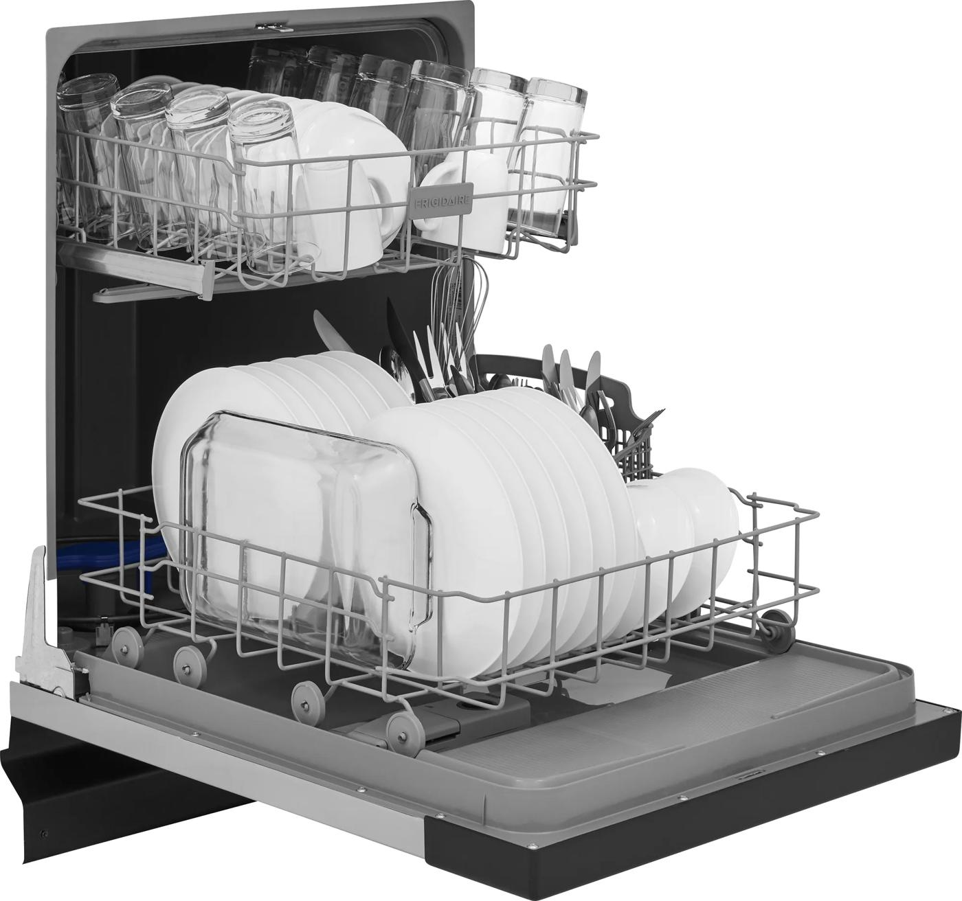 Open dishwasher with upper rack of glasses and plates and lower rack of white dishes and utensils for kitchen use
